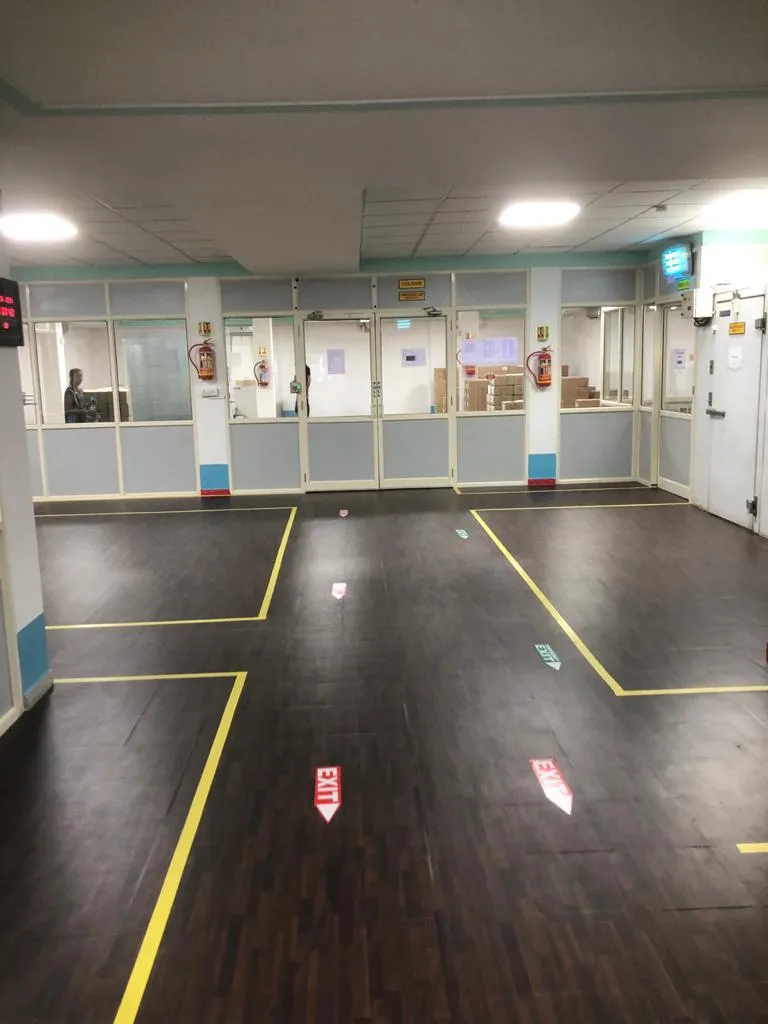 Clean room with marked lanes and an epoxy floor